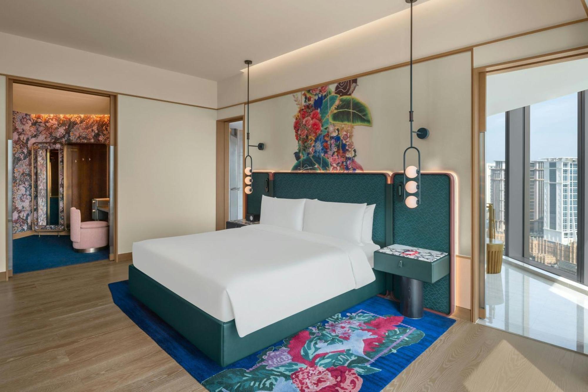 W Macau - Studio City 外观 照片 A bedroom at the hotel