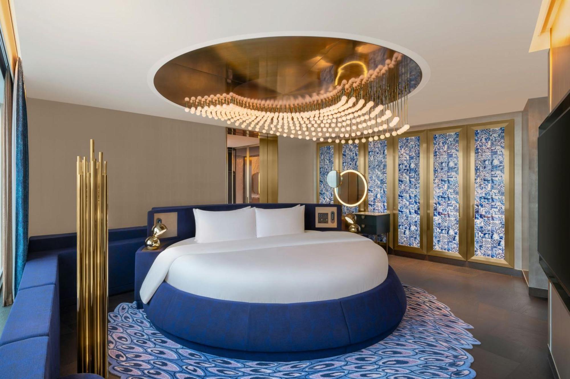 W Macau - Studio City 外观 照片 A bedroom at the hotel